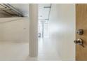 Bright hallway with modern design elements and natural light shining through the windows at 881 Memorial Se Dr # 307, Atlanta, GA 30316