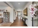 Welcoming entryway with wood flooring, decorative accents, and ample natural light, setting a warm tone at 122 Grove View Rd, Woodstock, GA 30189