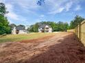 Expansive backyard showcasing the home's exterior design and extensive lot at 1465 Leach Dr, Lawrenceville, GA 30045