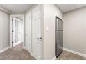 Hallway view featuring access to a room and a refrigerator alcove at 1501 Clairmont Rd # 1213, Decatur, GA 30033