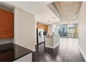 Bright living room featuring an open floor plan and floor-to-ceiling windows with city views at 950 W Peachtree Nw St # 1613, Atlanta, GA 30309