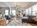 Stylish living room featuring a brick fireplace, contemporary decor, and ample natural light at 32 Howell Se St, Atlanta, GA 30312