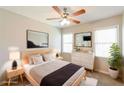 Bright and airy bedroom with a ceiling fan and lots of natural light at 1416 Emerald Pine Ct, Lawrenceville, GA 30043