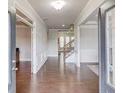 Bright, spacious foyer boasting hardwood floors and views of the staircase at 4240 Summer Breeze Way, Buford, GA 30518