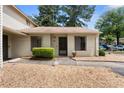 Charming single story home with neutral siding and a well-maintained yard, creating an inviting entrance at 1104 Country Ct, Lawrenceville, GA 30044
