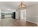 Well-lit kitchen with stainless steel appliances and bright backsplash at 708 Wind Song Trce, Woodstock, GA 30189