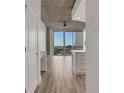 Bright living room with modern flooring, city views, and a built-in desk area at 3324 Peachtree Ne Rd # 2004, Atlanta, GA 30326