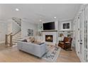 Cozy living room featuring a fireplace, comfortable seating, and elegant decor at 357 Mell Ave, Atlanta, GA 30307