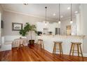Bright eat-in kitchen featuring granite countertops, stainless steel appliances, and classic white cabinets at 1126 Francis Ne St, Atlanta, GA 30319