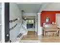 Inviting foyer with hardwood floors, staircase, and view to the living area at 2365 Valley Mill Dr, Buford, GA 30519
