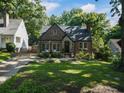 Brick home with stone accents and a beautifully landscaped front yard, creating a warm curb appeal at 978 Eden Se Ave, Atlanta, GA 30316