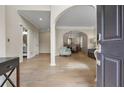 Inviting entryway showcasing hardwood floors and a view of the living and dining spaces at 3962 Coventry Park Ln, Peachtree Corners, GA 30096