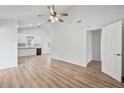 Open-concept living room features vaulted ceilings and wood flooring at 5153 Westbrook Pl, Union City, GA 30291