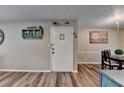 Inviting entryway with wood-look flooring and decorative accents at 6700 Roswell Rd # 22B, Atlanta, GA 30328