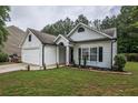 Inviting single-story home with manicured lawn and charming curb appeal at 7113 Silver Mine Xing, Austell, GA 30168