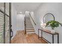 Inviting foyer with wooden floors, staircase, and decor at 574 Boulevard Ne Pl # 4, Atlanta, GA 30308