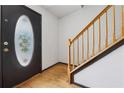 Entryway featuring hardwood flooring and a staircase at 475 Shadetree Ln, Lawrenceville, GA 30044