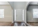 Inviting entryway with hardwood-style floors and lots of natural light at 6285 Polar Fox Ct, Riverdale, GA 30296