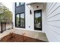 Close-up of the front entrance, showcasing modern architecture and clean, minimalist design at 101 Pearl St, Woodstock, GA 30188