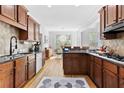 Updated kitchen with granite countertops, stainless steel appliances, and breakfast nook at 6069 Queens River Dr, Mableton, GA 30126