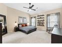 Spacious main bedroom with a walk in closet, large windows and neutral decor at 6069 Queens River Dr, Mableton, GA 30126