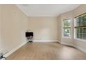 Inviting living room with neutral paint, bright windows, and modern flooring throughout at 1411 Primrose Park Rd, Sugar Hill, GA 30518