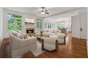 Bright and airy living room with a fireplace and hardwood floors at 4815 Westgate Drive, Cumming, GA 30040