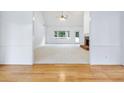 Bright living room with vaulted ceiling, fireplace, and neutral carpet at 2910 Waverly Place Dr, Dacula, GA 30019