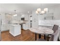 Beautiful, recently renovated kitchen featuring white cabinetry, stainless appliances, and a marble island at 2221 Shallowford Rd, Marietta, GA 30066