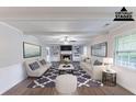 Staged living room with fireplace and built-in bookshelves at 1296 Carman Se Ct, Conyers, GA 30013
