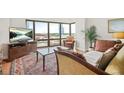 Comfortable living room with large windows boasting city views at 3475 Oak Valley Ne Rd # 950, Atlanta, GA 30326
