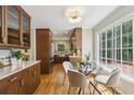 Bright eat-in kitchen featuring modern cabinets, stainless steel appliances, and a sunny breakfast nook with large windows at 95 Brandon Ridge Dr, Atlanta, GA 30328