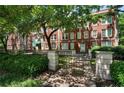Charming brick apartment building with a courtyard patio, perfect for enjoying the outdoors at 2840 Peachtree Nw Rd # 307, Atlanta, GA 30305