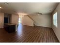 Spacious living room with hardwood floors and lots of natural light at 6474 Grey Fox Way, Riverdale, GA 30296
