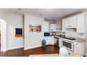 Bright kitchen with white cabinets and stainless-steel appliances at 117 Joseph E Lowery Nw Blvd, Atlanta, GA 30314