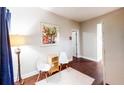 Cozy living area features hardwood floors and a warm lamp at 117 Joseph E Lowery Nw Blvd, Atlanta, GA 30314