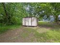 Durable shed in backyard is perfect for lawn and garden equipment storage at 2584 Shadowbrook Dr, Decatur, GA 30034