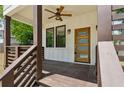 Inviting front porch with wood-look ceiling and decorative front door at 515 Cohen St, Atlanta, GA 30310