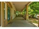 Spacious front porch with views of the surrounding greenery, offering a peaceful and serene outdoor living space at , Atlanta, GA 30310