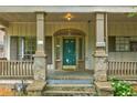 Welcoming front porch with a classic design, providing a cozy and inviting entrance to the home at , Atlanta, GA 30310