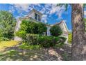 A lush array of foliage surrounds the home, adding to its secluded charm at 7161 Boulder Pass, Union City, GA 30291