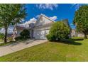 Traditional single-Gathering home with a two-car garage, showcasing great curb appeal at 7161 Boulder Pass, Union City, GA 30291