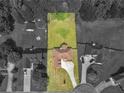 Aerial view showcases the property's layout, large lot, mature trees, and neighborhood surroundings at 127 Autumn Run Pl, Villa Rica, GA 30180
