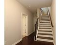 Entryway featuring hardwood floors, staircase, and neutral paint at 3220 Creole Ln, Avondale Estates, GA 30002