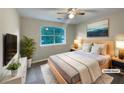 Cozy main bedroom featuring natural light and stylish decor for a relaxing and peaceful retreat at 3508 Sweetgum Ln, Decatur, GA 30032