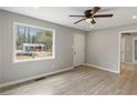 Bedroom featuring a large window for natural light and neutral walls at 2309 Carver Nw Dr, Atlanta, GA 30314