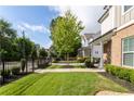 Well-maintained front yard features lush green grass, manicured landscaping, and an inviting walkway leading to the home at 2792 Mathews Se St, Smyrna, GA 30080