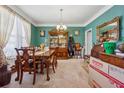 Dining room featuring stylish furnishings, decorative accents, and ample natural light creating an inviting atmosphere at 2372 Wilshire Way, Douglasville, GA 30135