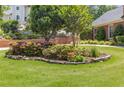 Well-maintained flower bed with colorful blooms in the front yard of a beautiful home at 828 Jami Ct, Lawrenceville, GA 30046