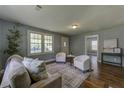 Comfortable living room featuring ample natural light and stylish decor at 103 Chicamauga Sw Ave, Atlanta, GA 30314